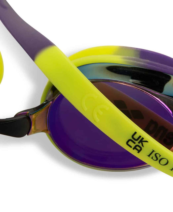 Arena Tracks mirror racing goggles in violet, plum, and lime with reflective lenses for competitive swimming.